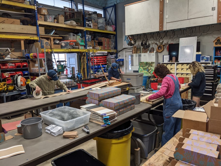 The BeeFoster crew at work building bee hotels